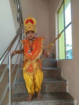 Child dressed as Rama